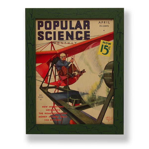 Framed original 1937 Popular Science magazine cover of a flying experimental airplane. Framed with a one of a kind hand painted picture frame.