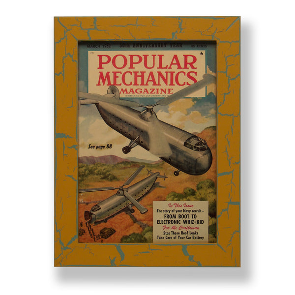 Framed original 1952 Popular Mechanics magazine cover with two futuristic helicopters. Framed with a one of a kind hand painted picture frame.