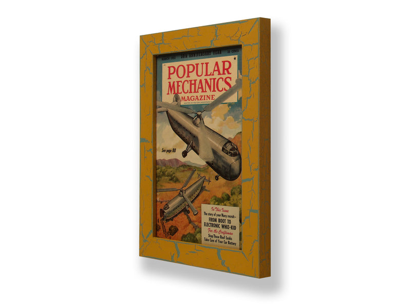 Framed original 1952 Popular Mechanics magazine cover with two futuristic helicopters. Framed with a one of a kind hand painted picture frame.