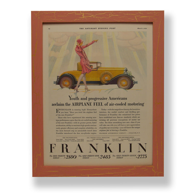 Framed original 1929 magazine ad for a Franklin car. Framed with a one of a kind hand painted picture frame.