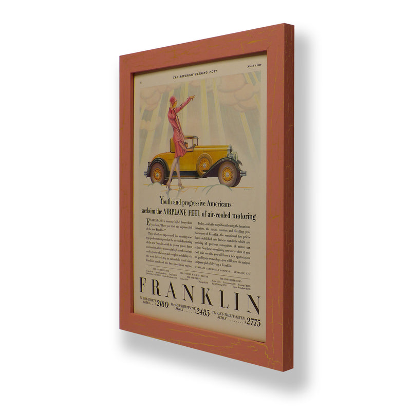 Framed original 1929 magazine ad for a Franklin car. Framed with a one of a kind hand painted picture frame.