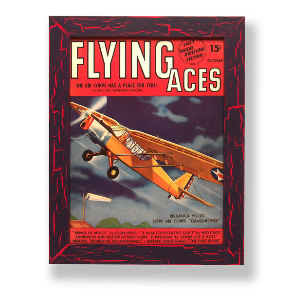 Framed original 1941 Flying Aces magazine cover with New Air Corps “GRASSHOPPER” airplane. Framed with a one of a kind hand painted picture frame.