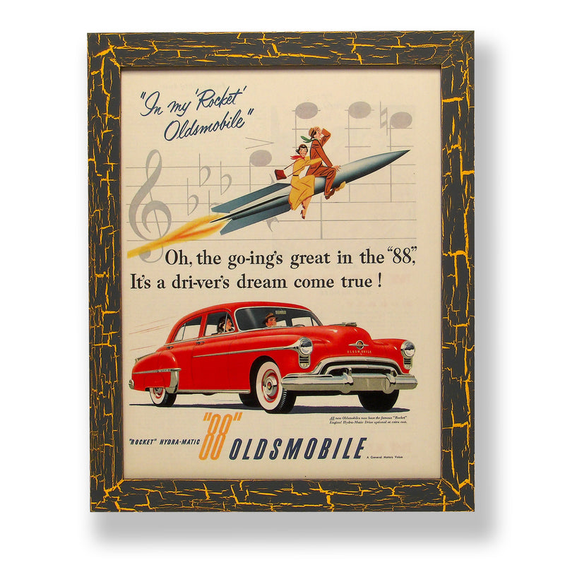 Framed original 1950 magazine ad for a 1950 Oldsmobile 88 car. Framed with a one of a kind hand painted picture frame.