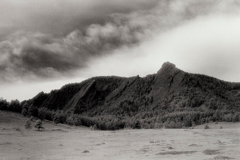 Art Print - An Infrared black & white photograph of the Flatirons rock formation.