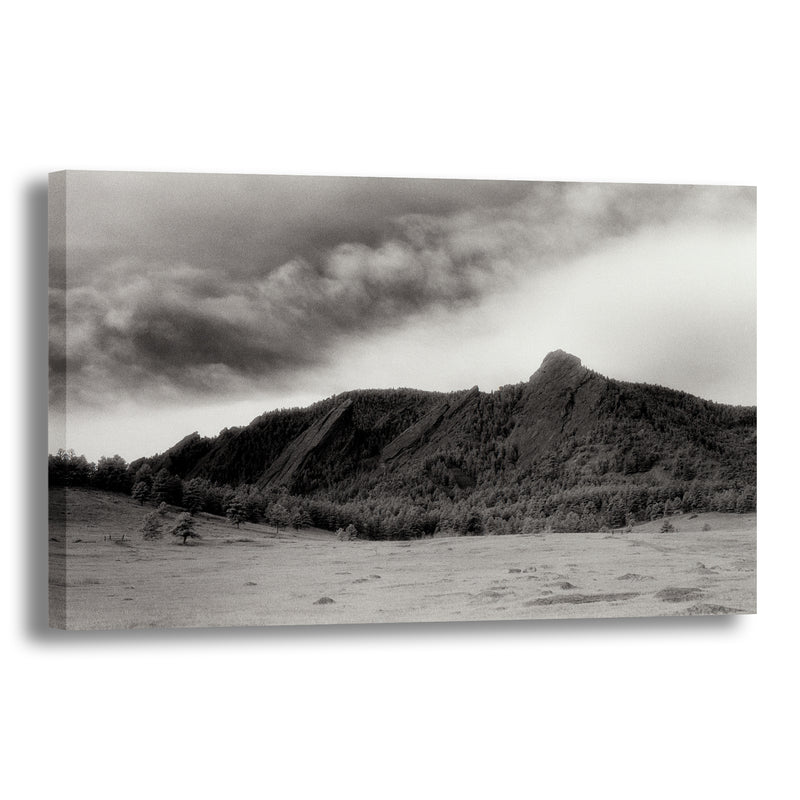 Canvas Art Print - An Infrared black & white photograph of the Flatirons rock formation.