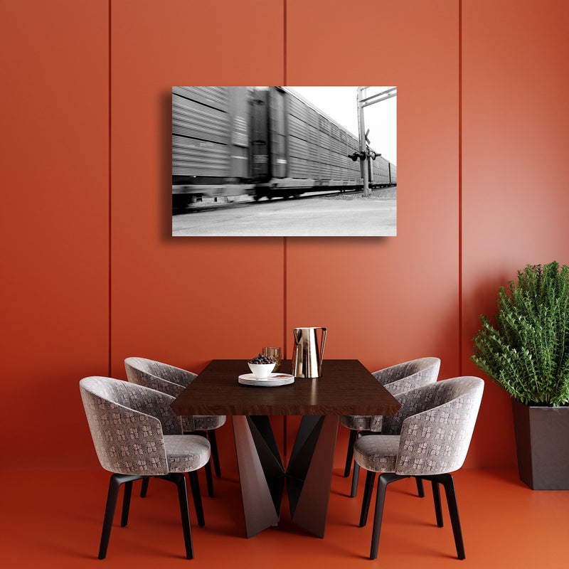 Art Print - A blurred motion photograph of a train at a railroad crossing.